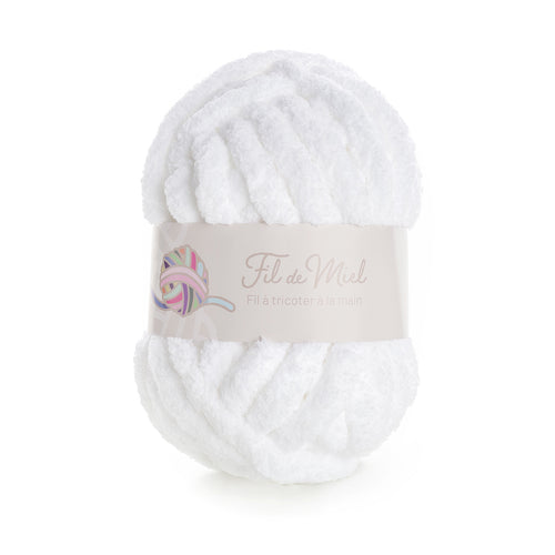 Fil XXL Blanc Neige: pelote de laine blanche ultra-douce, label « Fil de Miel » et logo couleur sur étiquette.
