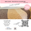 Couverture tricotée épaisse en fil XXL avec motifs colorés beige et brun. ALT text concis pour SEO.